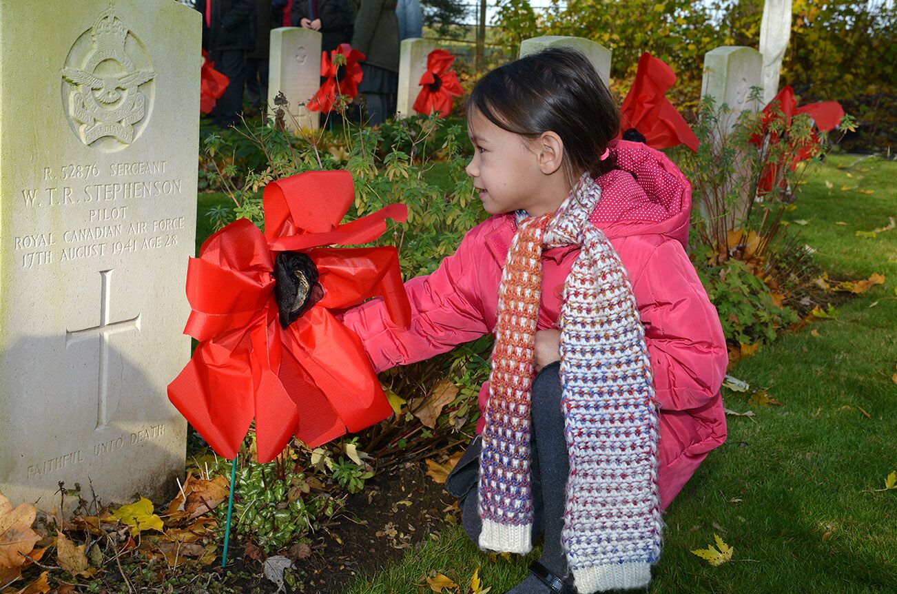 Placing the poppies during the remembrance event